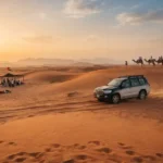 Desert adventures tourism experience with dunes and safari vehicles in the UAE